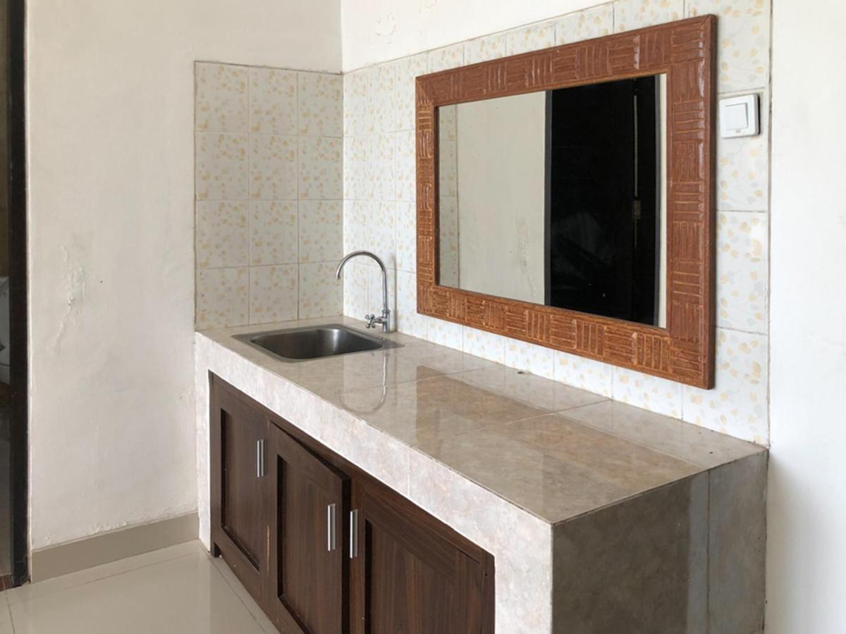 Reddoorz Plus Near Dreamland Beach جيمباران المظهر الخارجي الصورة