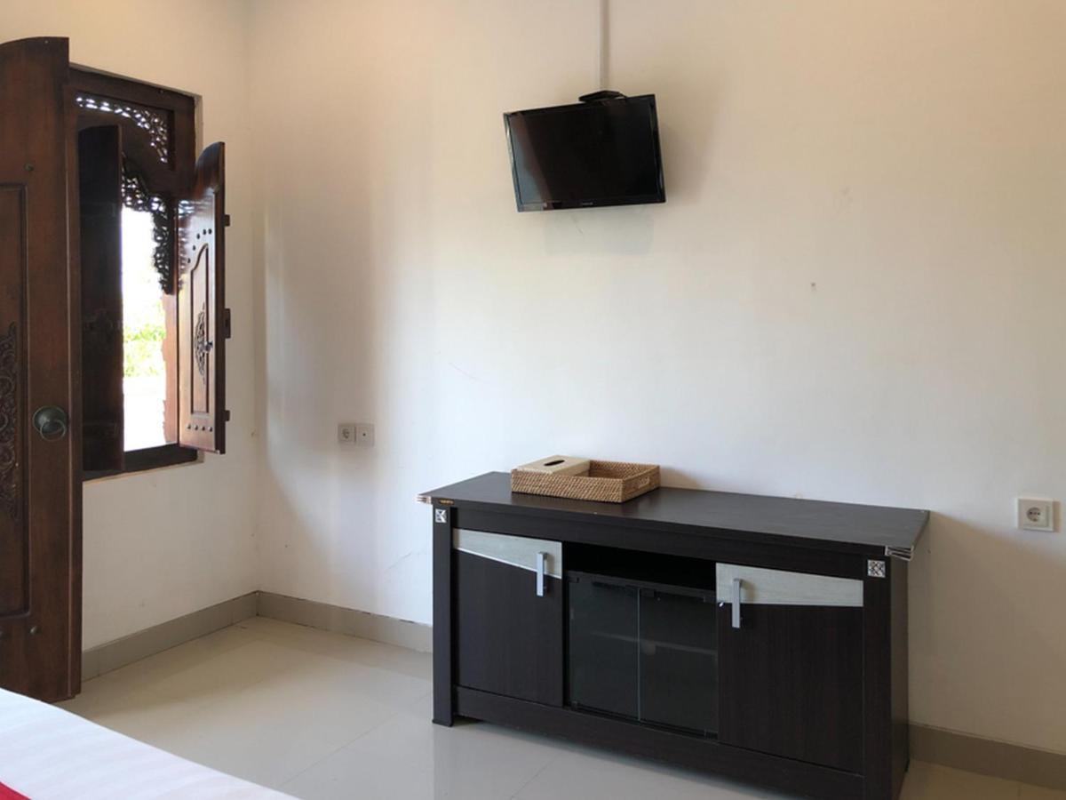 Reddoorz Plus Near Dreamland Beach جيمباران المظهر الخارجي الصورة