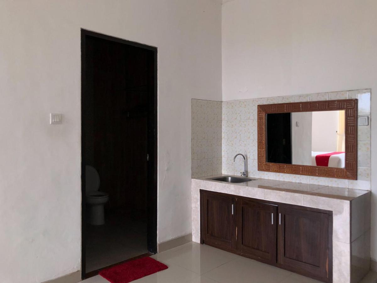 Reddoorz Plus Near Dreamland Beach جيمباران المظهر الخارجي الصورة