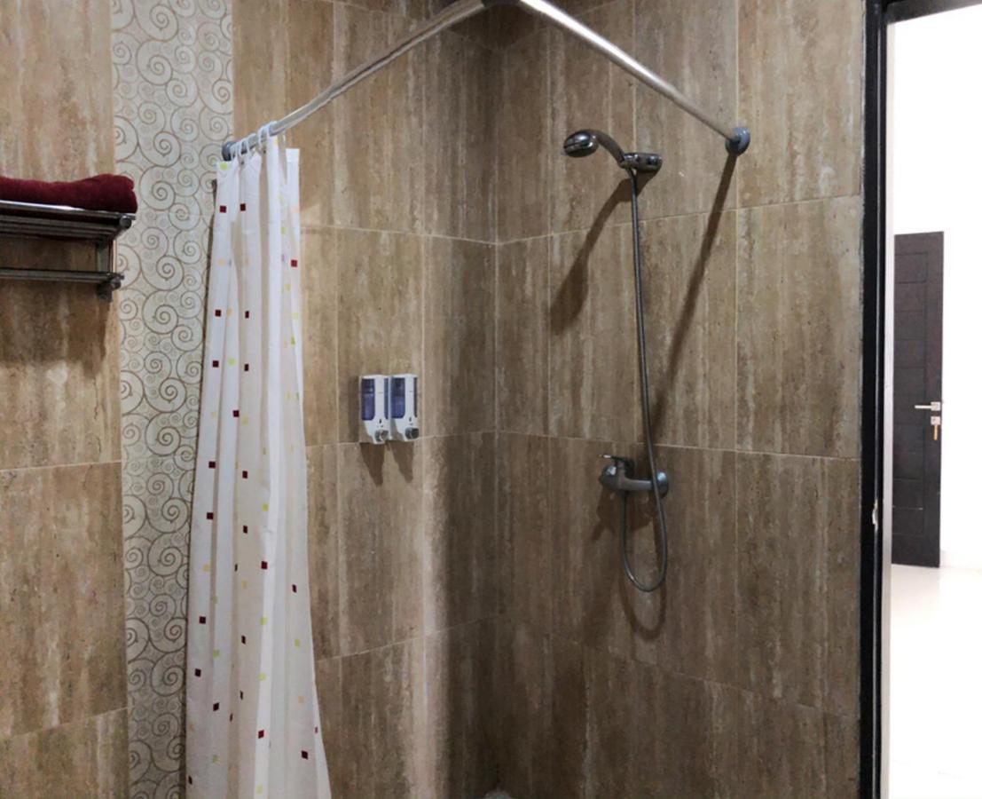 Reddoorz Plus Near Dreamland Beach جيمباران المظهر الخارجي الصورة