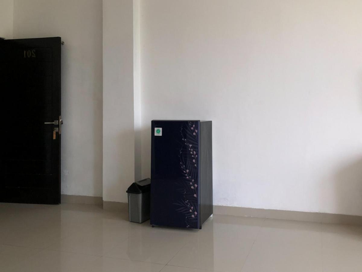 Reddoorz Plus Near Dreamland Beach جيمباران المظهر الخارجي الصورة