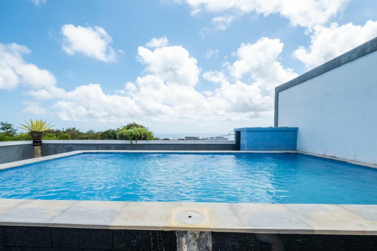 Reddoorz Plus Near Dreamland Beach جيمباران المظهر الخارجي الصورة