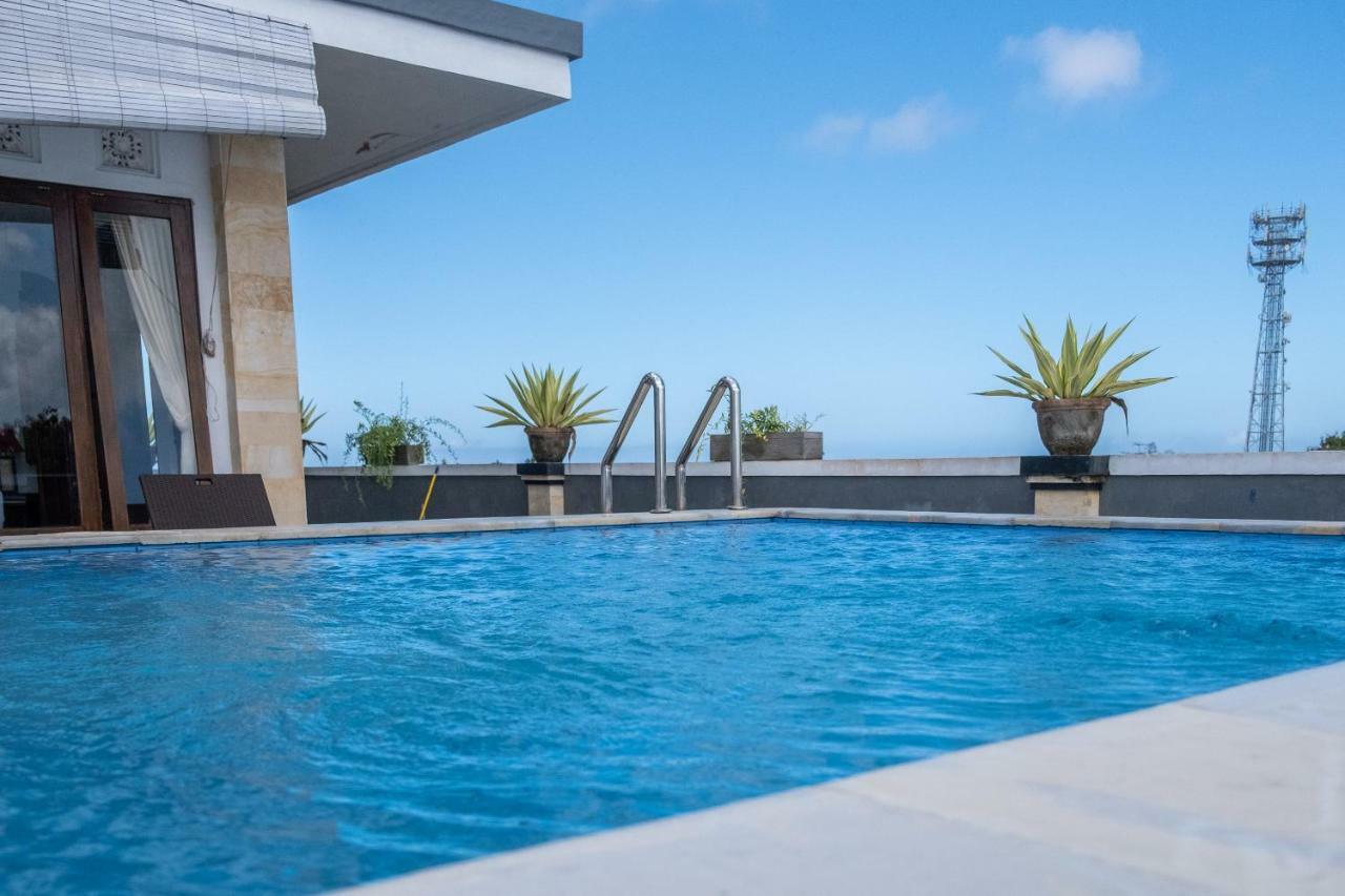 Reddoorz Plus Near Dreamland Beach جيمباران المظهر الخارجي الصورة